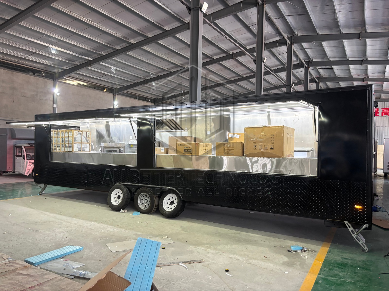 Custom Food Truck | Black Exterior | Large Serving Windows | Triple Axle